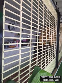 Cửa cuốn TT thương mại - sp song ngang tròn sơn tĩnh điện